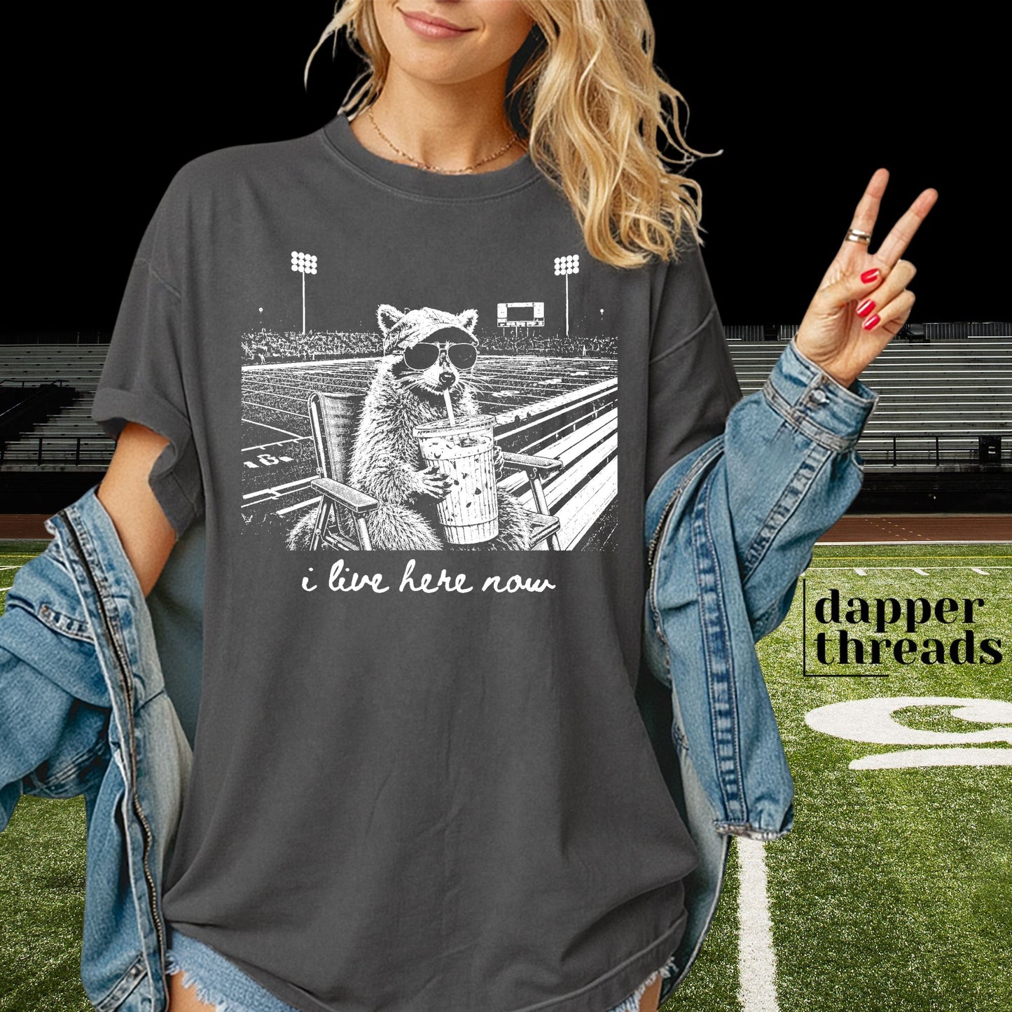 I Live Here Now Football Raccoon Tee