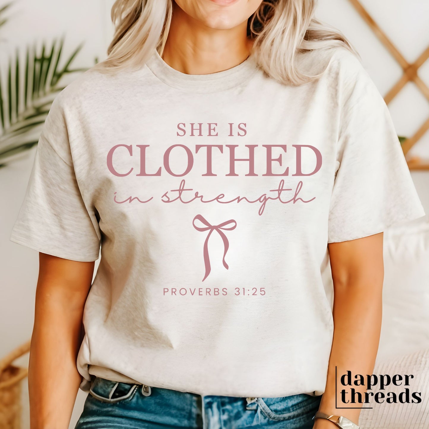 She Is Clothed In Strength Bow Tee